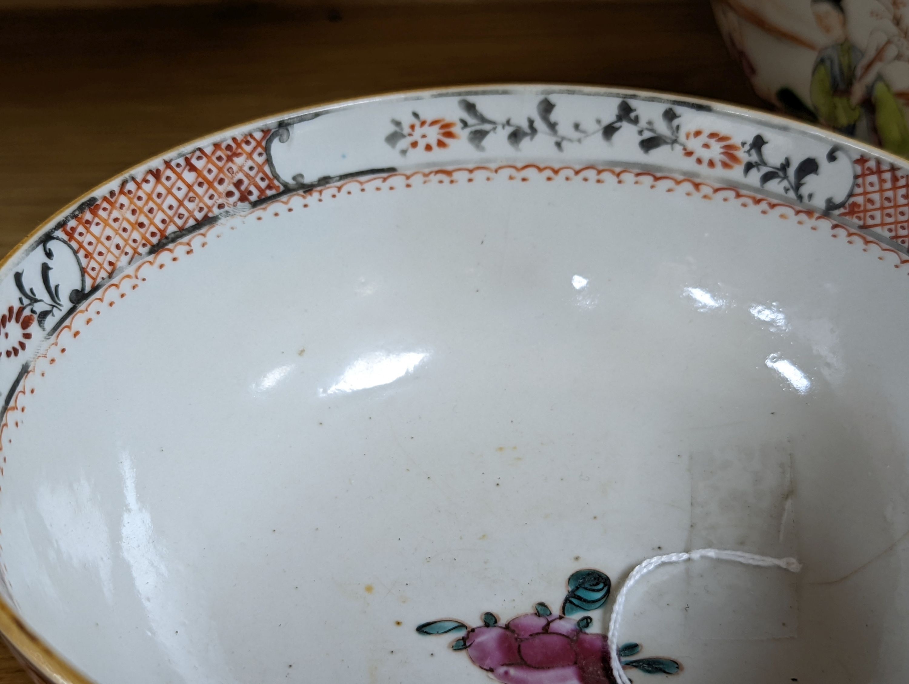 Two 18th century Chinese export bowls, a similar tea bowl and another Chinese blue and white tea bowl, largest 20cm diameter